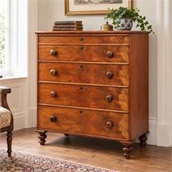 Victorian mahogany chest, with four long  flame mahogany fronted drawers with turned woode...