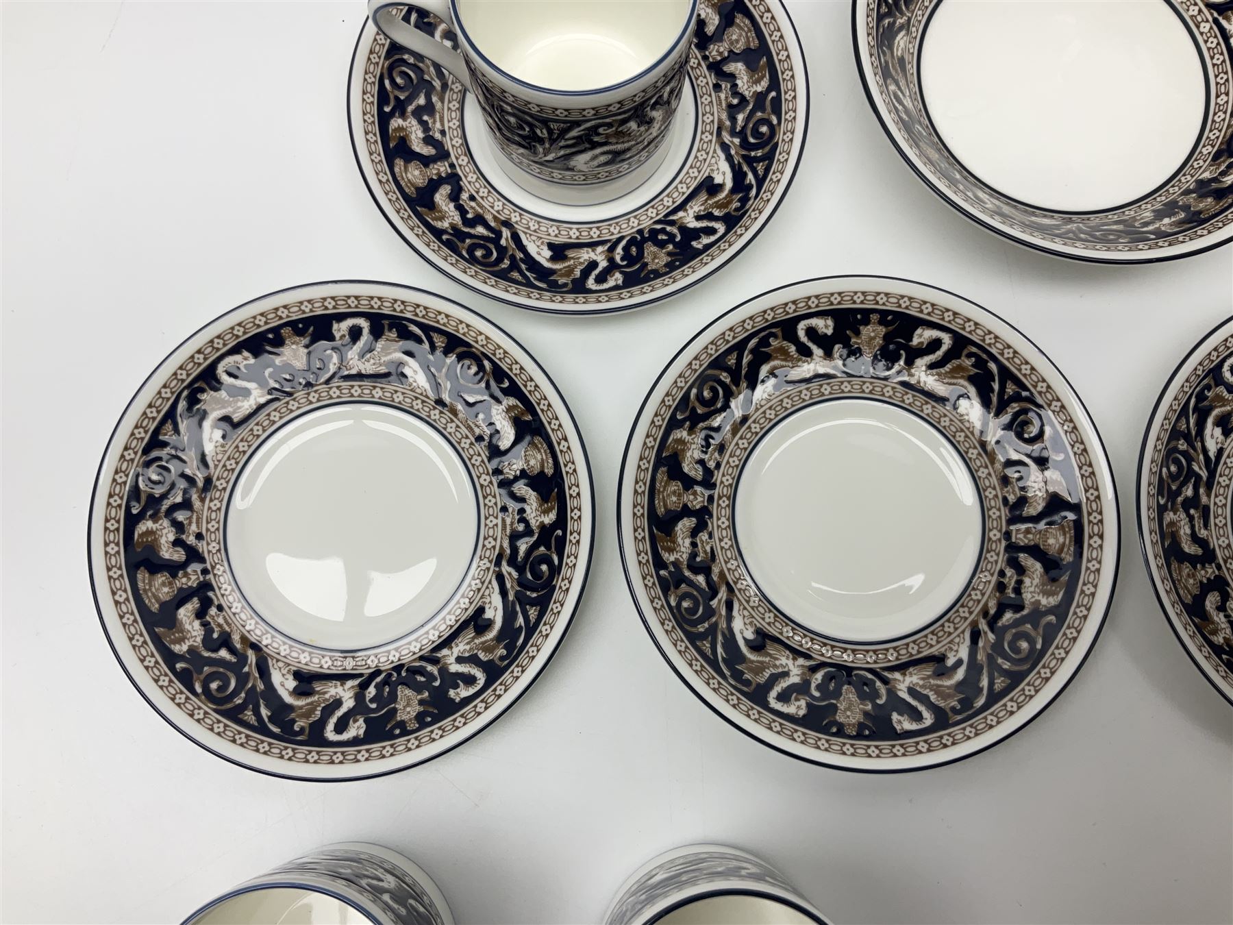 Wedgwood navy Florentine pattern coffee service for six, comprising coffeepot, coffee cans and saucers, milk jug, twin handled covered sucrier and small dish