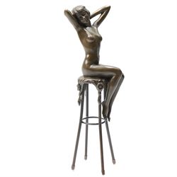 After D H Chiparus, an art deco style bronze modelled as a nude female figure seated upon ...