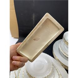 Royal Albert Val D'or part tea and dinner service, including two coffee pots, two teapots, milk jug, covered sucrier etc together with matching items 