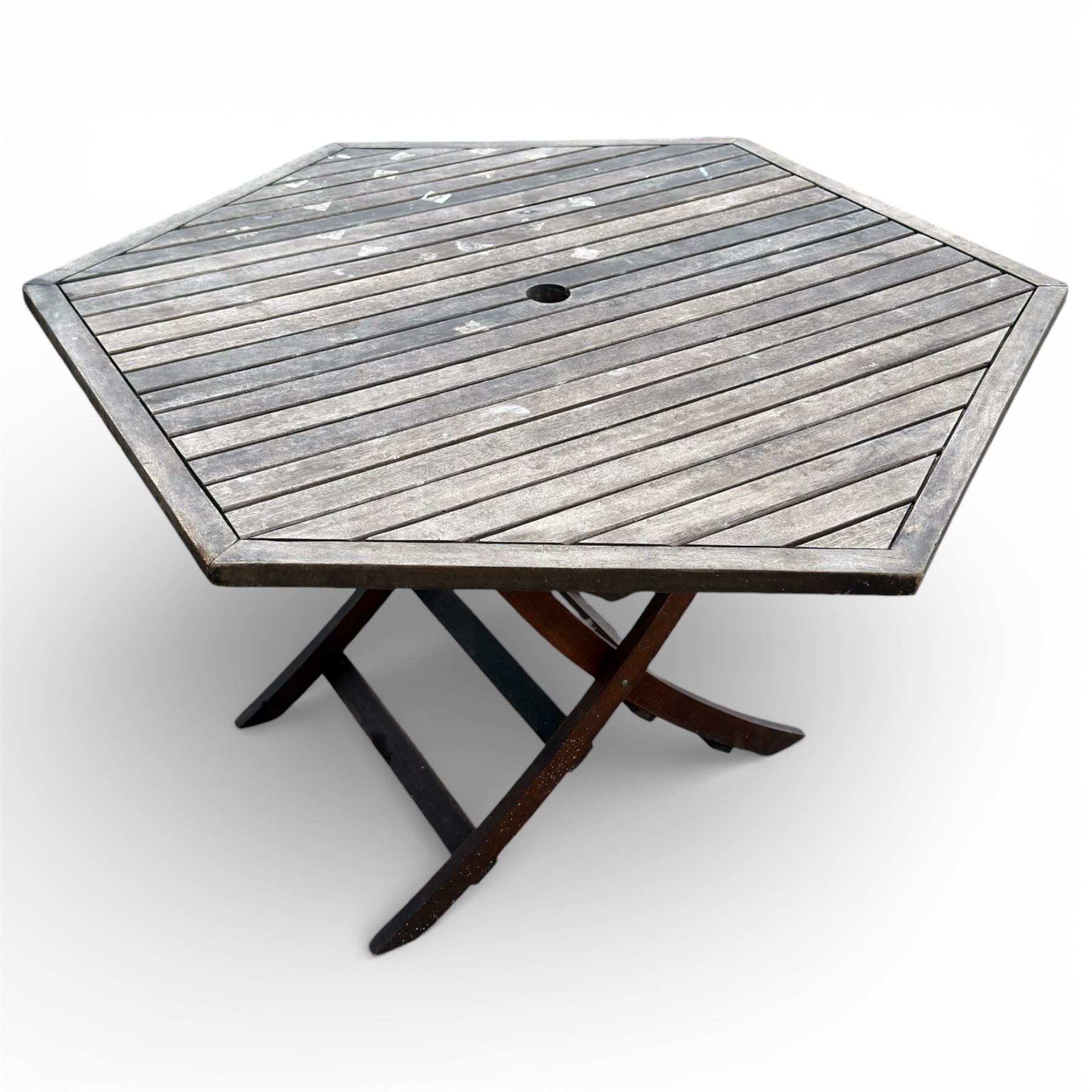 Hexagonal garden table and set of four folding chairs