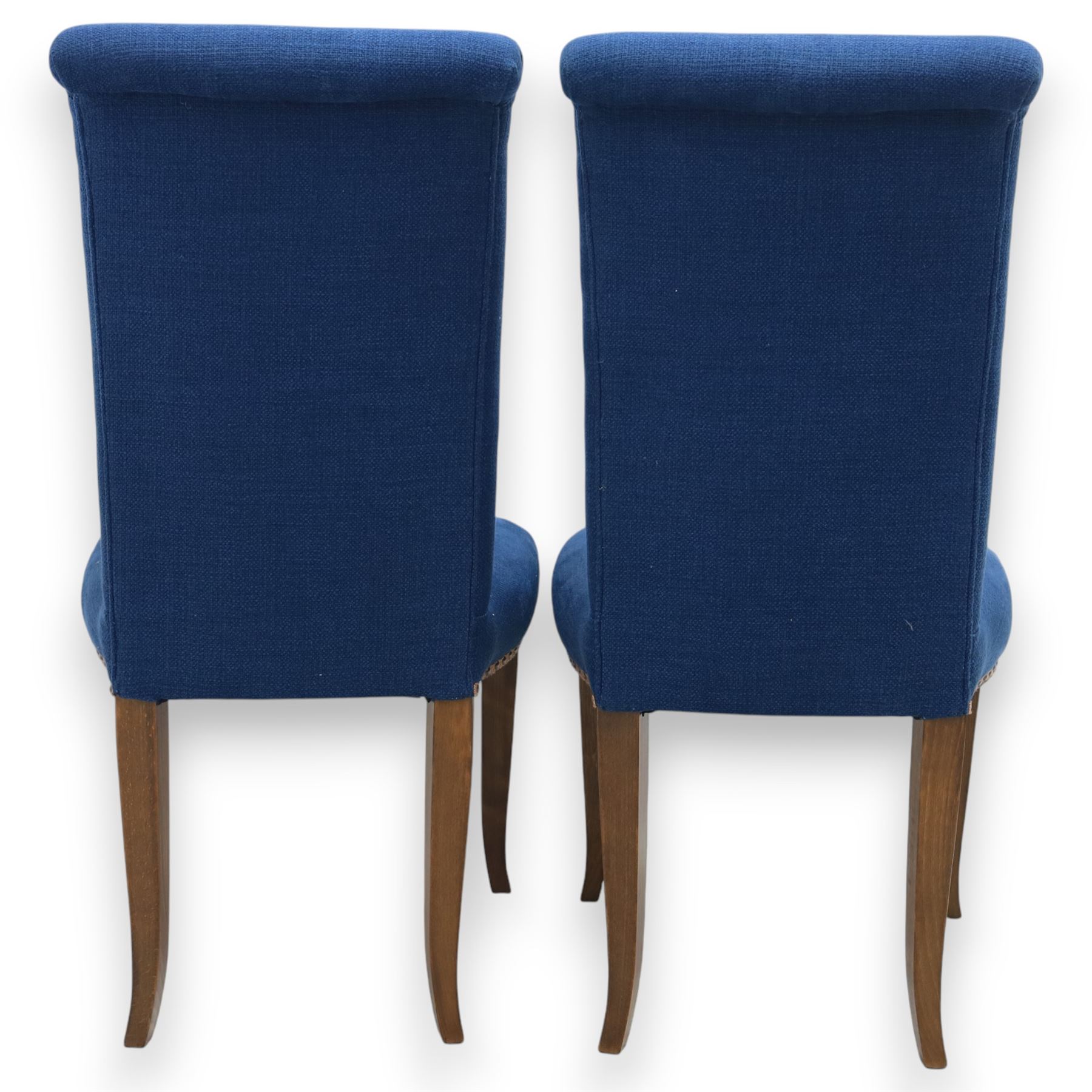 Contemporary set of four blue high back upholstered dining chairs