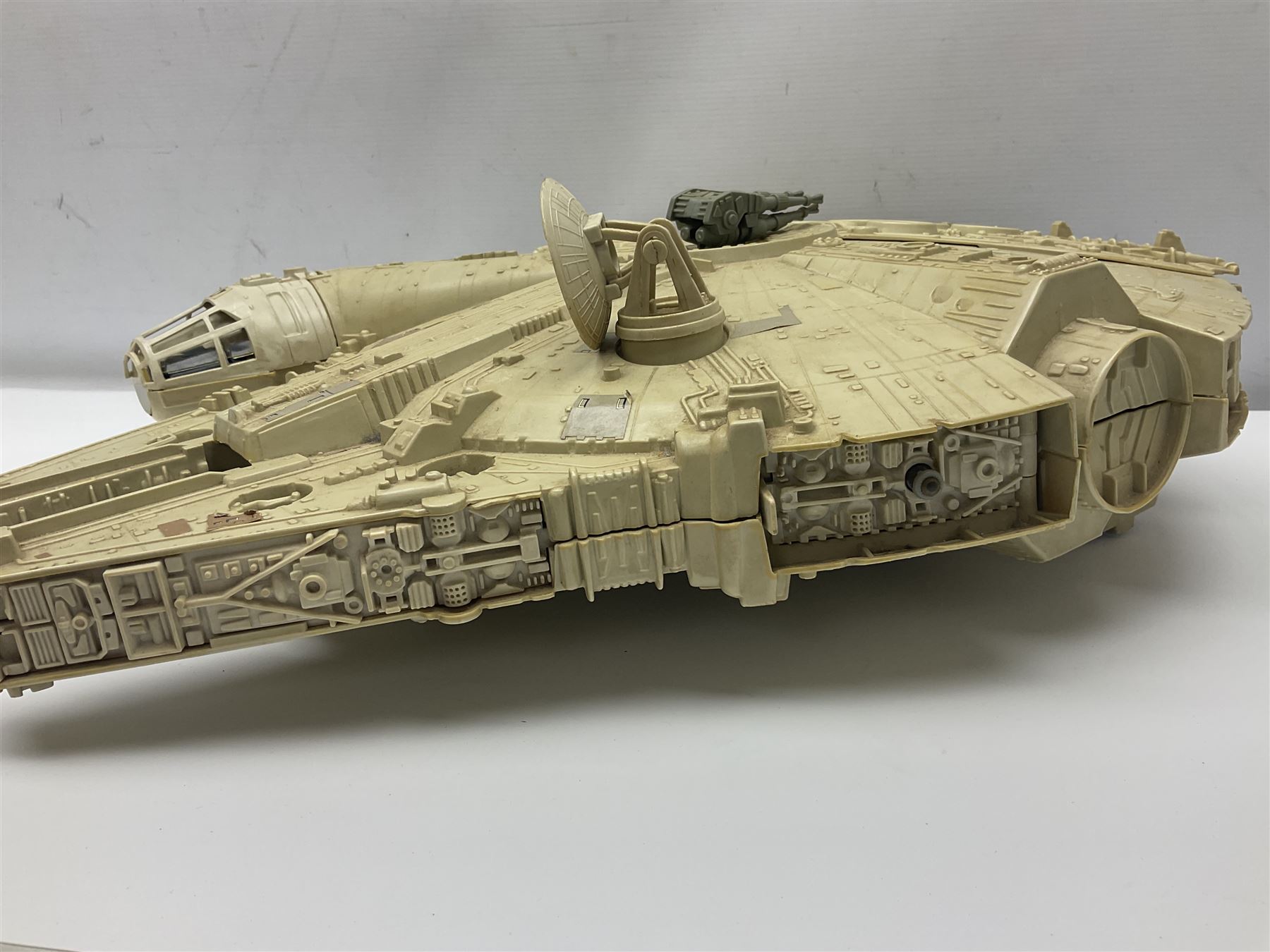 Star Wars - two unboxed vintage Star Wars vehicles comprising Millenium Falcon with 3 3/4