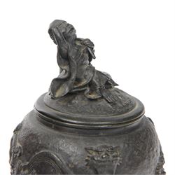 Pair of Japanese bronze koro, raised upon three feet, he body of the koro decorated with figures and animals, the cover mounted with figures, H24cm