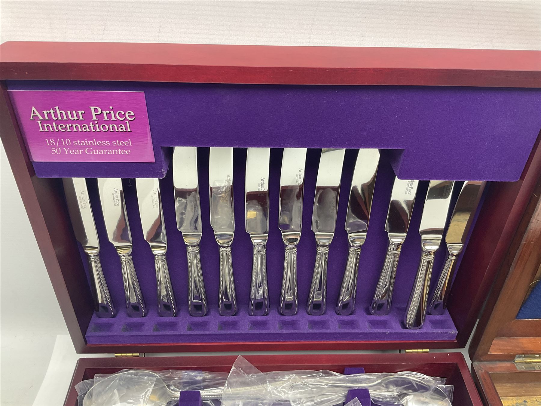 Arthur Price canteen of 18/10 stainless cutlery, together with another box