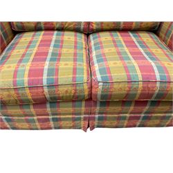 Traditional shaped two seat sofa, upholstered in tartan patterned fabric