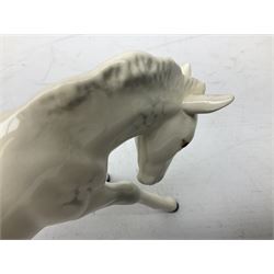 Seven Beswick figures of horses, including Connemara pony in grey no.1641, Arab in bay no.1265, large foal in grey no.947 etc, together with a Goebel figure of a horse (8)