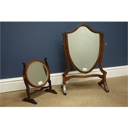  Georgian style mahogany shield shaped dressing table mirror, H63cm & a smaller oval mirror, H32cm (2)  