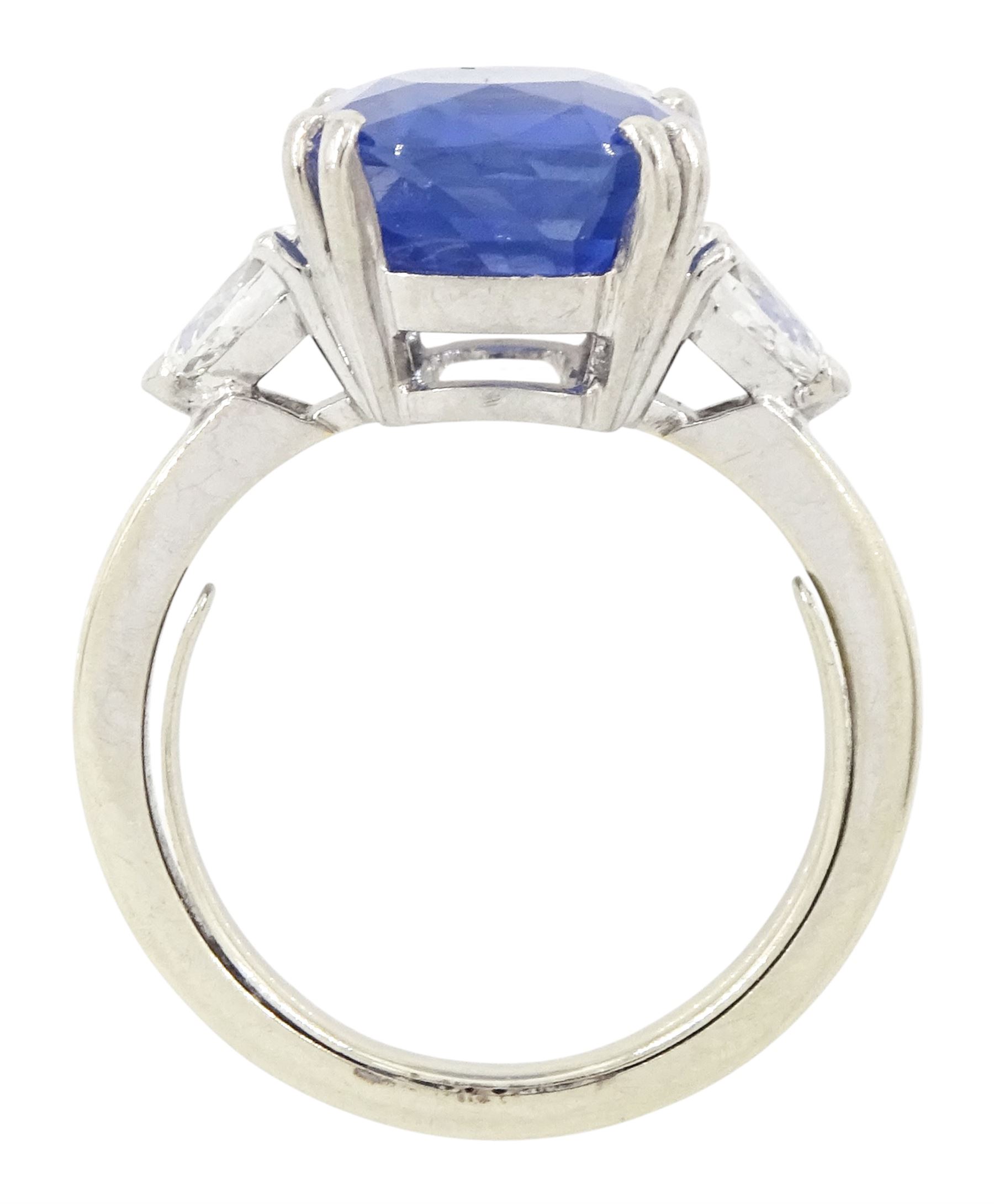 French 18ct white gold and platinum three stone unheated Ceylon sapphire and diamond ring, the single mixed cushion cut sapphire of 8.49 carat, with Gem Paris report, flanked by pear cut diamonds, hallmarked, total diamond weight approx 0.60 carat