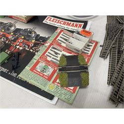 Fleischmann ‘N’ gauge - quantity of track, couplings, switches and accessories to include no.9481 Dump Car Unloader, two transformers and a mid 1980s Fleischmann catalogue 