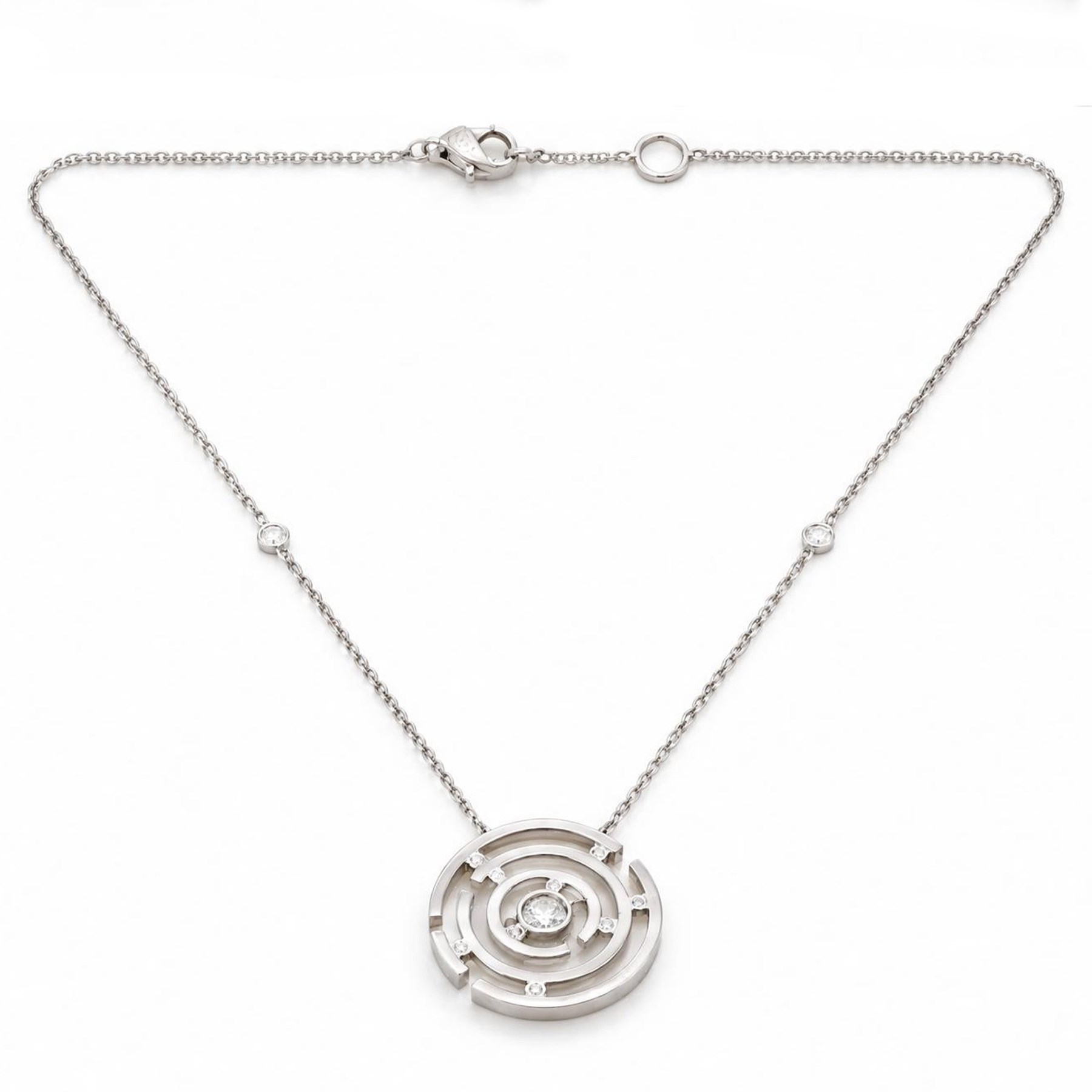 Boodles 18ct white gold Maze pendant necklace, set with ten round brilliant cut diamonds, to a trace link chain necklace set with two further diamonds and diamond set clasp, London 2014, total diamond weight 0.40 carat