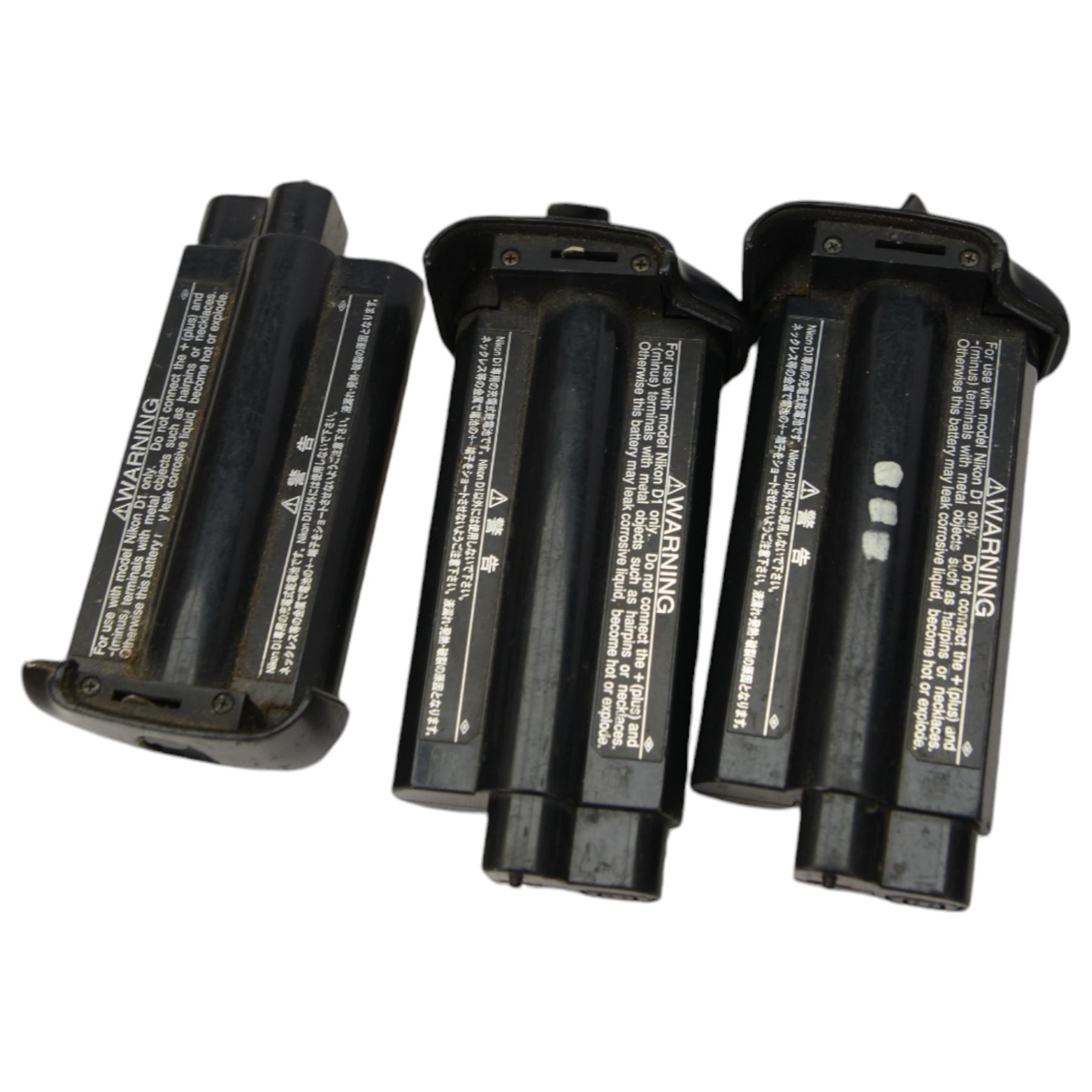 Nikon D1H digital SLR camera body serial no. 5207443, together with a Nikon D5100 digital camera body serial no. 6102034, with some associated battery packs and accessories