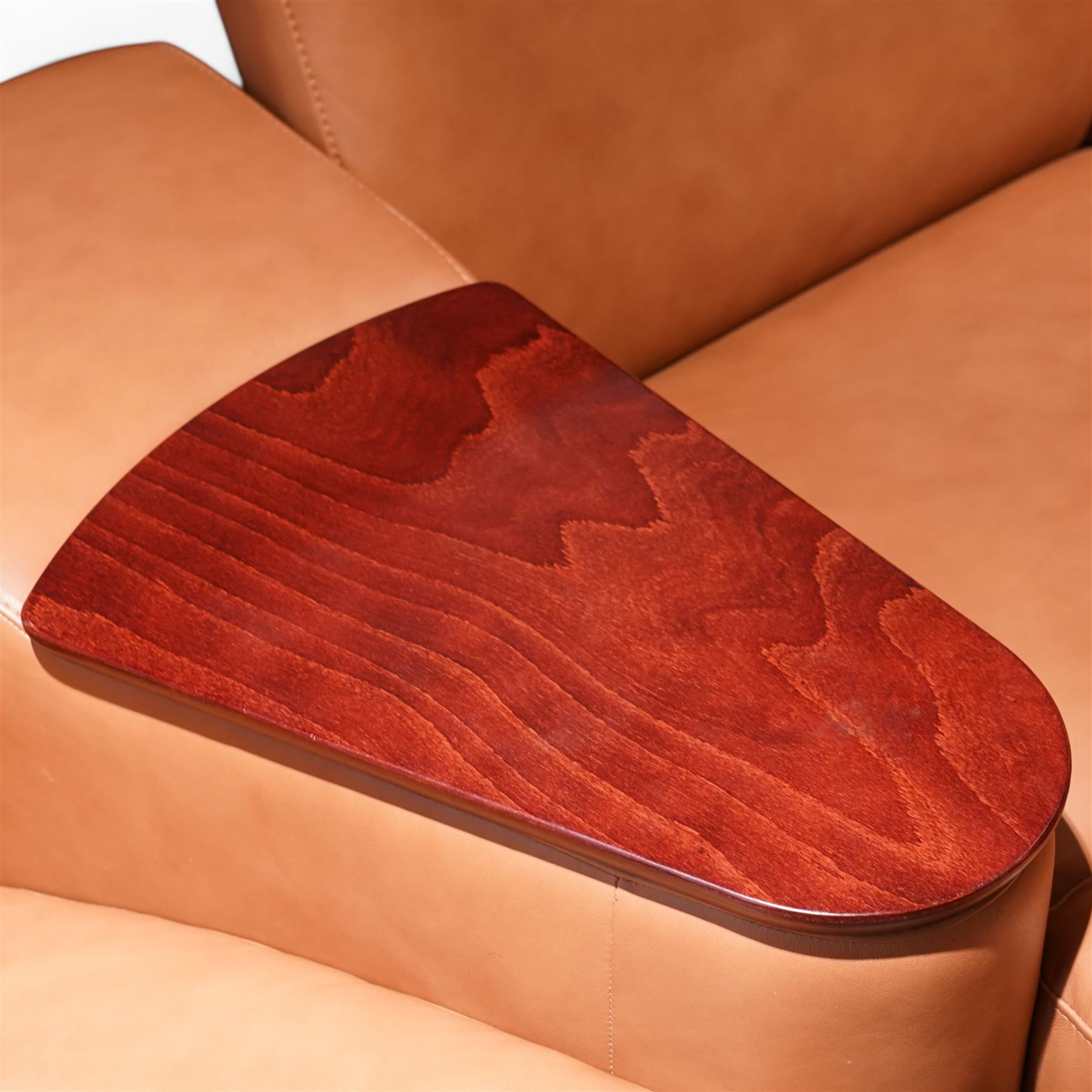 Stressless - 'Arion' four seat recliner cinema sofa, fitted with rests and drink holders, (W300cm, H101cm, D107cm), upholstered in tan leather, with matching rectangular ottoman (118cm x 60cm, H50cm)