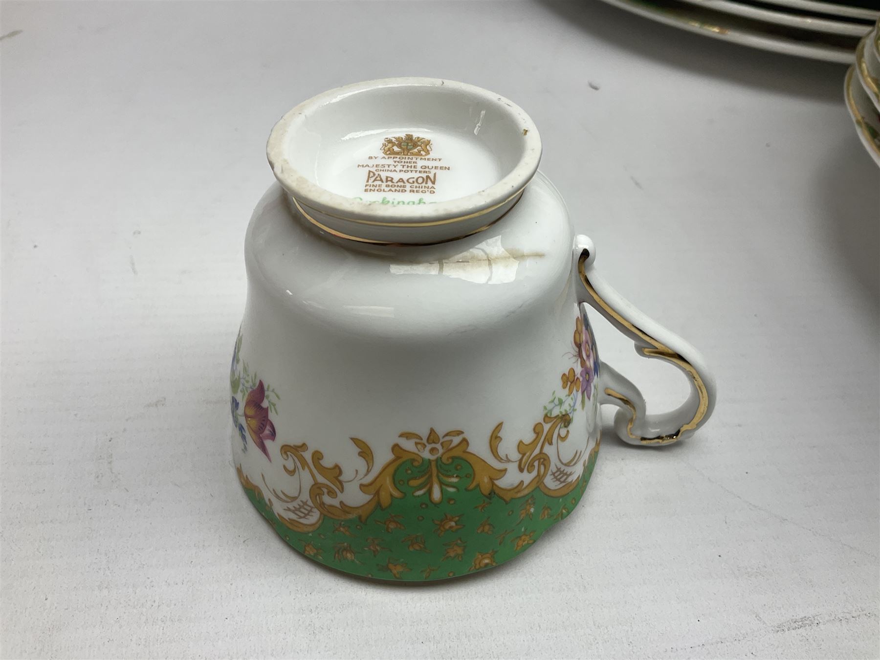 Paragon Rockingham pattern part tea and dinner service including three teapots, milk jug, cups and saucers of various sizes, ten soup bowls, ten side plates, ten dinner plates etc (96)