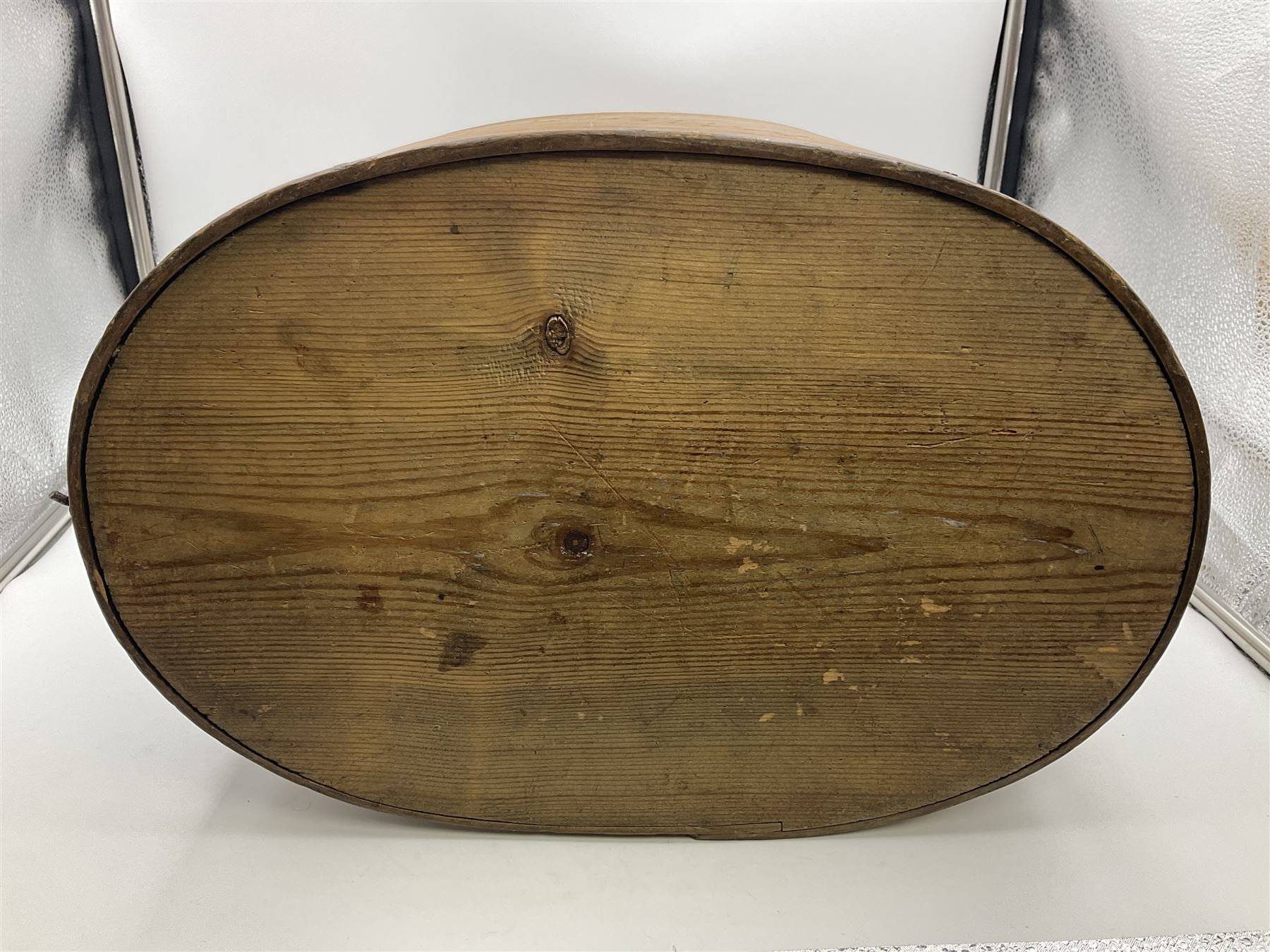 19th century Scandinavian Svepask / Tine box, the pine oval form body with notched posts and conforming lid decorated with Folk Art style pokerwork decoration and single carry handle, L38cm