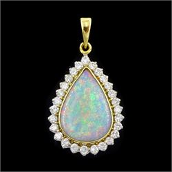 18ct gold pear cut opal and round brilliant cut diamond pendant, Sheffield 1992, opal appr...