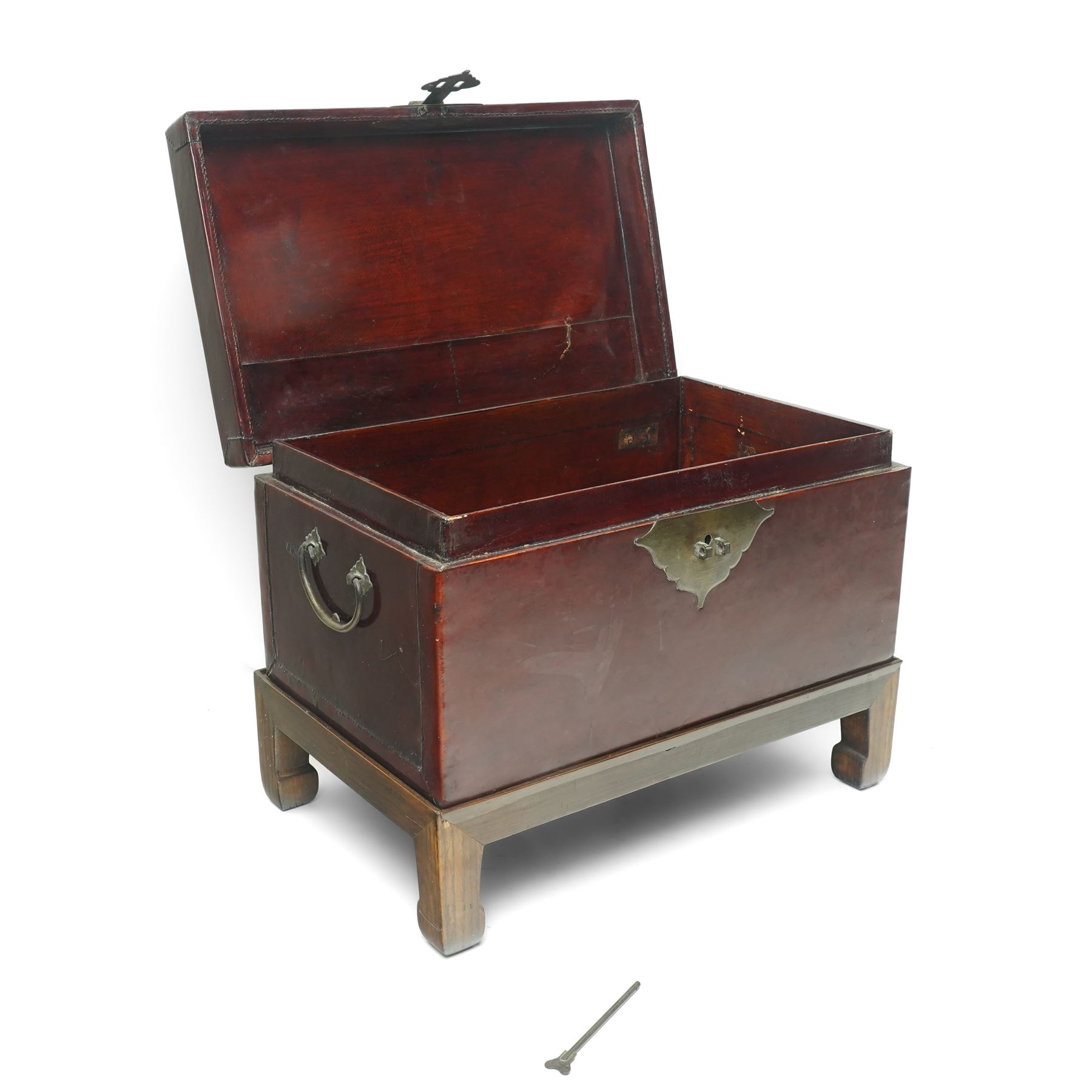 Chinese red lacquered chest on hardwood stand, with twin carrying handles, including stand H37cm x W49cm