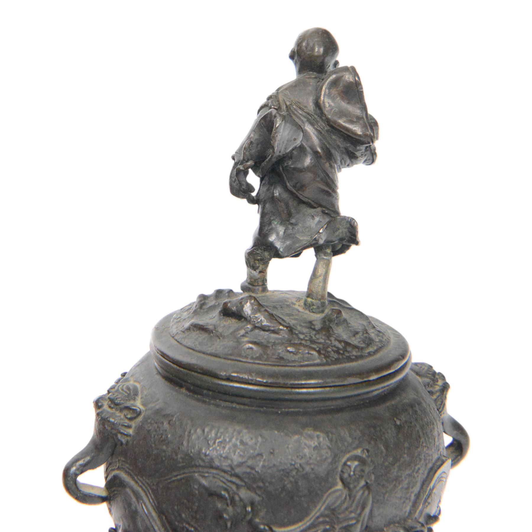 Pair of Japanese bronze koro, raised upon three feet, he body of the koro decorated with figures and animals, the cover mounted with figures, H24cm