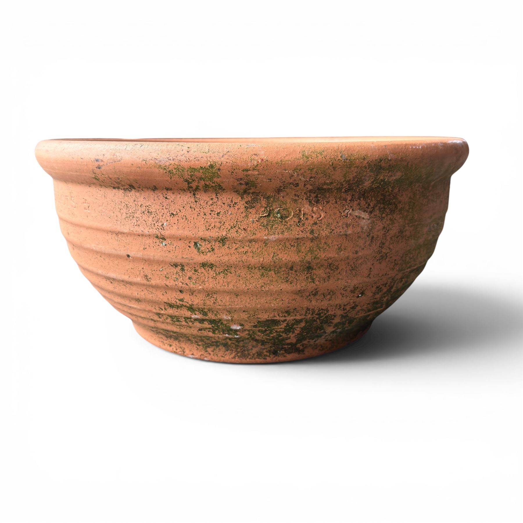 Collection of five terracotta garden planters along with rectangular sandstone trough 