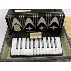 GDR Firotti piano accordion with black and silver case, sixteen keys and forty-eight buttons L38cm; in simulated reptile skin case with sheet music