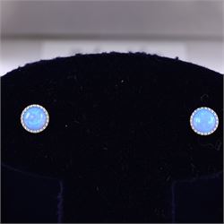 Pair of silver opal stud earrings, boxed