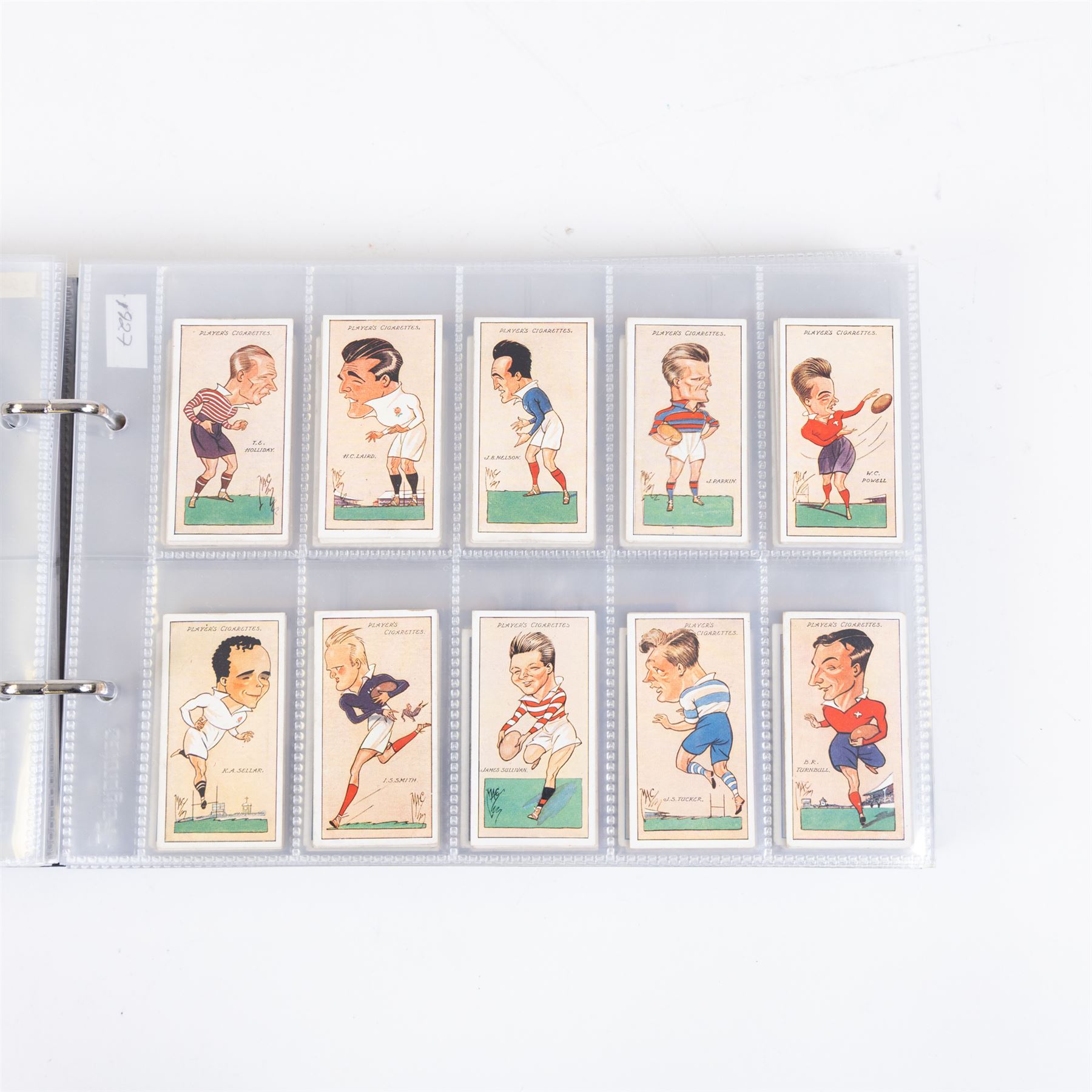 Collection of Edwardian and later Football related trading and cigarette cards, including forty-nine of fifty 1906 Ogden's Football Club Colours, 1922 PALS Footall series, ninety of one hundred 1925 Gallaher Famous Footballers, complete set of forty-four 1926 Ogden's Captains of Association Football Clubs and Colours, complete set of fifty 1927 Players Football Caricatures by MAC,  complete set of fifty 1927 Players Football Caricatures by RIP,  complete set of fifty 1930 Players Association Cup Winners, complete set of 50 1933 Ogdens AFC Nicknames etc, housed in brown cigarette card album