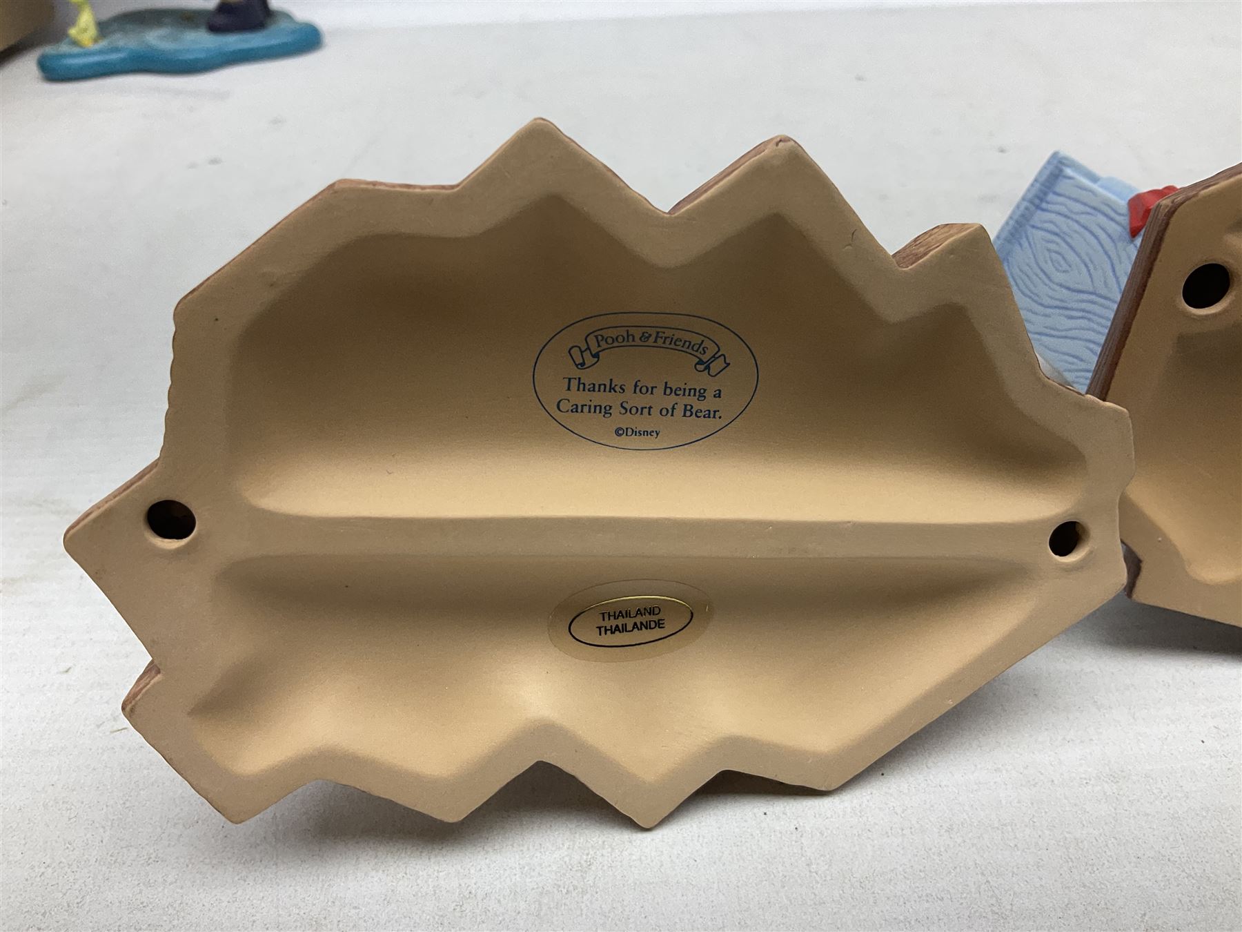 Collection of eight Disney Pooh and Friends figures, comprising Hip, hip Poohray for birthdays, Tricks and treats for someone sweet, We'll share forever whatever the weather, Thanks for being a Caring Sort of Bear, Now it's perfect just like you, Have a red-shirt red letter day, Life is sweet and I love you Mama, all with boxes