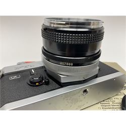 Canon FTb camera body, serial no. 715838, with 'Canon FD 50mm 1:1.8' lens, serial no. 207888, in original box, together with Canon FTb camera body, serial no. 557817, with 'Canon FD 35mm 1:3.5 S.C' lens, serial no. 126210 and Canon EX Auto camera body, serial no. 296244 with 'Canon EX 50mm 1:1.8' lens, serial no. 380869  