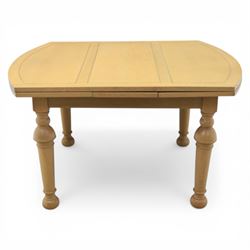 Edwardian light oak extending dining table, oval-ended rectangular top with panelled decor...