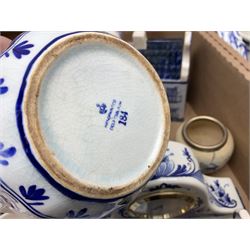 Collection of Delft ware and similar, to include vase of baluster form with cover, a pair of fluted vases, clock, covered trinket box etc, in two boxes  