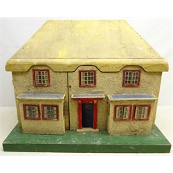  1930s Tri-ang No.1 Princess dolls house based on the Welsh Cottage 'Y Bwthyn Bach' L76cm x H60cm with some furniture and a three storey children's dolls house with some furniture, H83cm (2)  