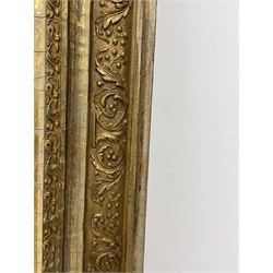 20th century gilt frame rectangular mirror, ornate central cartouche pediment set with two winged dragons, the frame decorated with scrolling leafage and berries