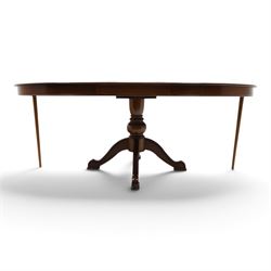 Barker & Stonehouse - cherrywood oval extending dining table and four upholstered chairs, the table with additional leaf extended to cm, raised on a turned column above swept supports, the chairs with brown upholstery and multi-coloured geometric design