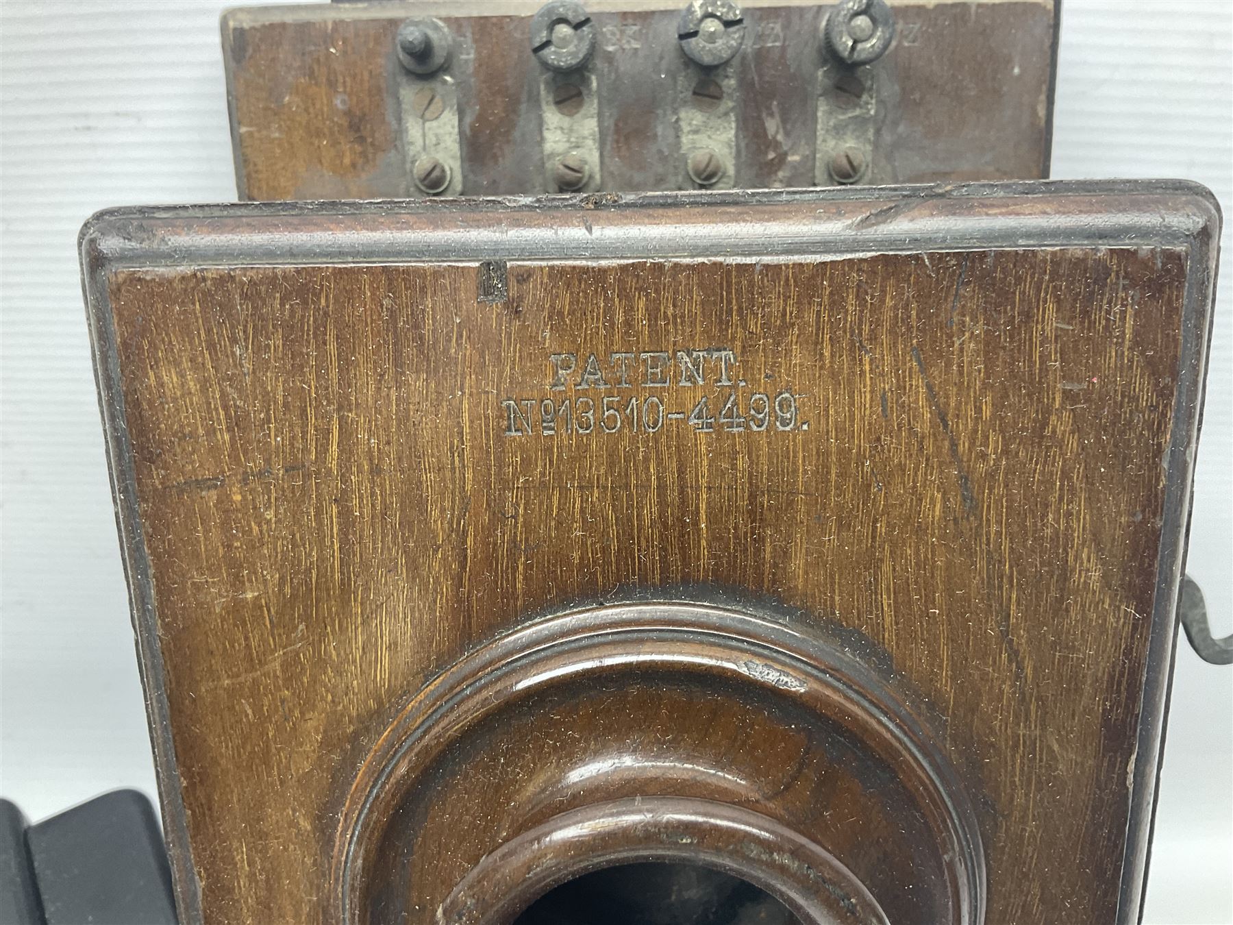 Collection of phone headsets, including GPO bakelite examples, together with other telephone parts 