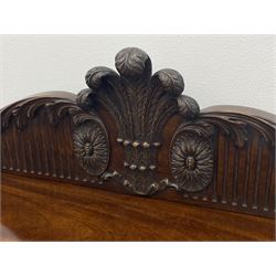 Early 20th century Hepplewhite style serving table, raised fleur-de-lis feather back with fluted detail and flower head mounts, the shaped top with carved foliate edge over single central drawer with applied urn motif, turned and reeded acanthus supports with recessed castors