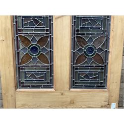 Early 20th century pine six panel door with later stained glass panels