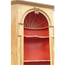  Georgian style pine barrel back corner bookcase, lunette carved cornice above shaped shelves with acanthus carved pediment, flower head carved and moulded surround, on plinth base, W103cm, H229cm  