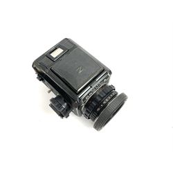 Zenza Bronica S2A medium format camera body, with Zenza Bronica Zenzanon MC '1:2.4 f-80mm' lens, together with Nippon Kogaku Nikkor-P '1:4 f-200mm' lens, Nikkor D.C '1:4 f-40mm' lens, two film backs and other camera equipment, housed in a hard flight case