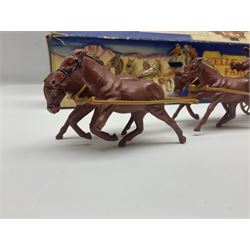 Mickey Mouse Trick Star battery operated drummer figure; Illco Mickey Mouse battery operated Fun Castle Roller Coaster; battery operated Western Express Locomotive; and JK Wells Fargo Overland Stage scale model; all boxed (4)