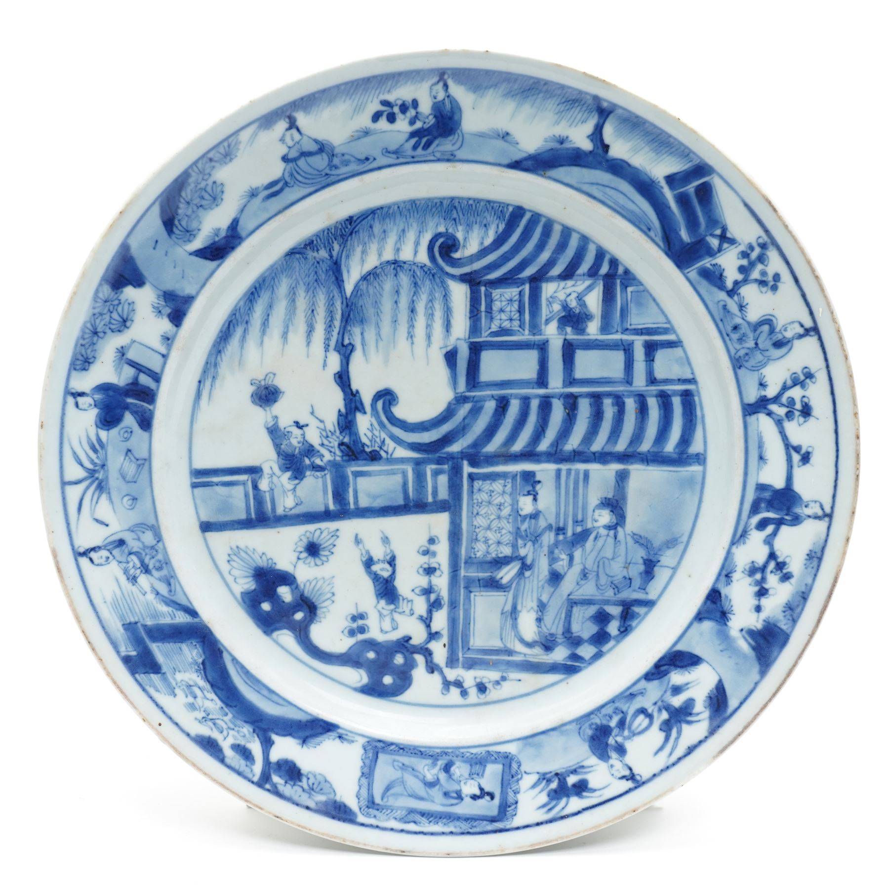 Chinese Kangxi period blue and white plate, decorated with figures in a pavilion, D26cm 
