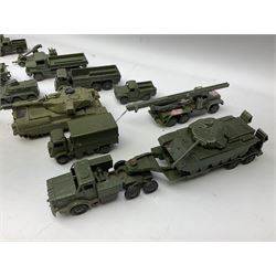 Dinky - twenty unboxed and playworn die-cast military vehicles including Mighty Antar tank Transporter No.660 with Centurion Tank No.651; Chieftain Tank; Army wagon No.623; Medium Artillery Tractor No.689; Berliet Gazelle; 10-Ton Army Truck No.622; US Jeep; three 1-Ton Cargo Trucks No.641; Armoured Car No.670; Armoured Personnel Carrier; Field Artillery Tractor No.688; Scout Car No.673; etc