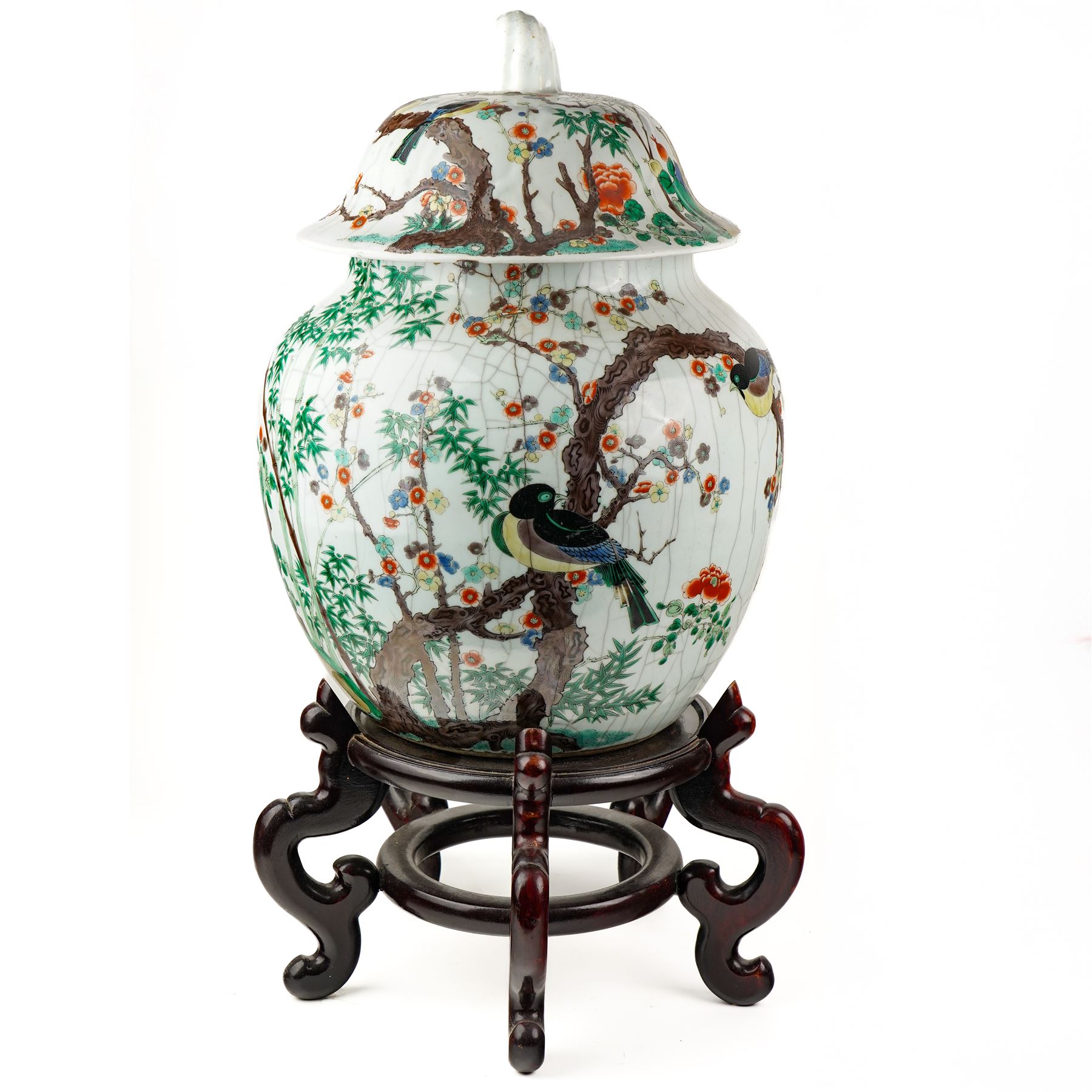 Late 19th century Chinese famille verte crackled ice pot and cover, of ovoid form, decorated with birds, blossom and bamboo, the cover with handle formed as a root, with hardwood display stand H50cm
