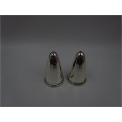 Pair of modern silver salt and pepper shakers, of tapering faceted form, hallmarked Laurence R Watson & Co, Birmingham 2009, H7cm, boxed 