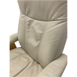 Ekornes - Stressless armchair upholstered in cream leather with matching footstool 
