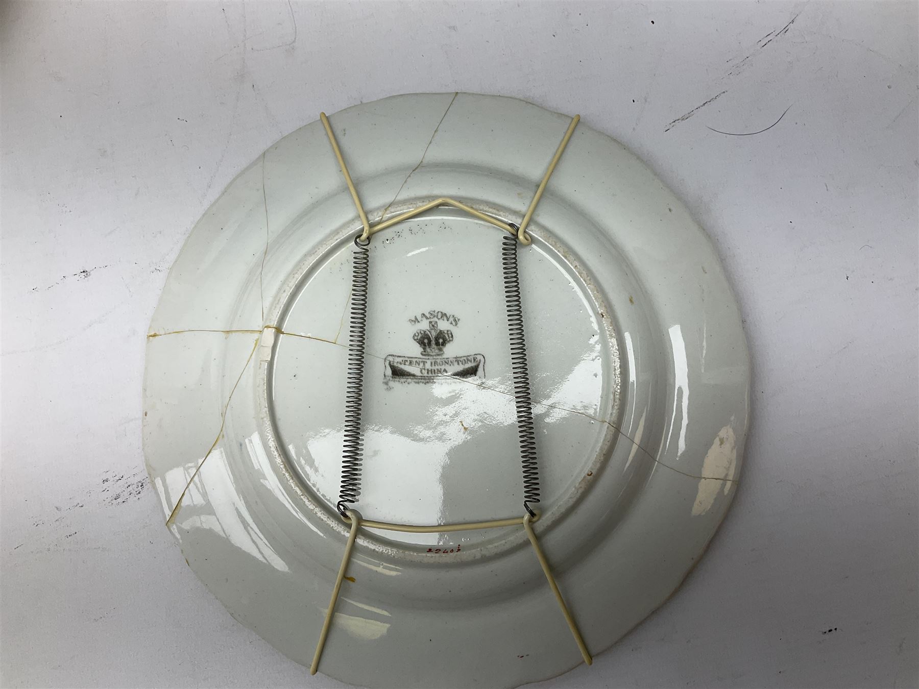 Four mid 19th century Mason's Ironstone plates decorated in the Chinese Antiquities pattern, the central circular panel decorated with footed vase with stylised motifs within a floral border, with gilt detail, pattern no. 1438, largest D26cm, together with Royal Worcester plate with floral decoration within green borders, blue and white tankard with pewter lid and teapot, teapot
