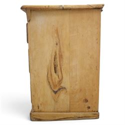Victorian stripped pine sideboard, rectangular plank top rounded edges, with central cupboard door with shaped panel, flanked by two banks of three graduating drawers with turned knobs, raised on a plinth base 