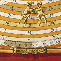 Hermes 'Astrologie' or 'Dies et Hore' silk scarf, in red and gold colourway, designed by Francoise Faconnet, 86cm x 86cm