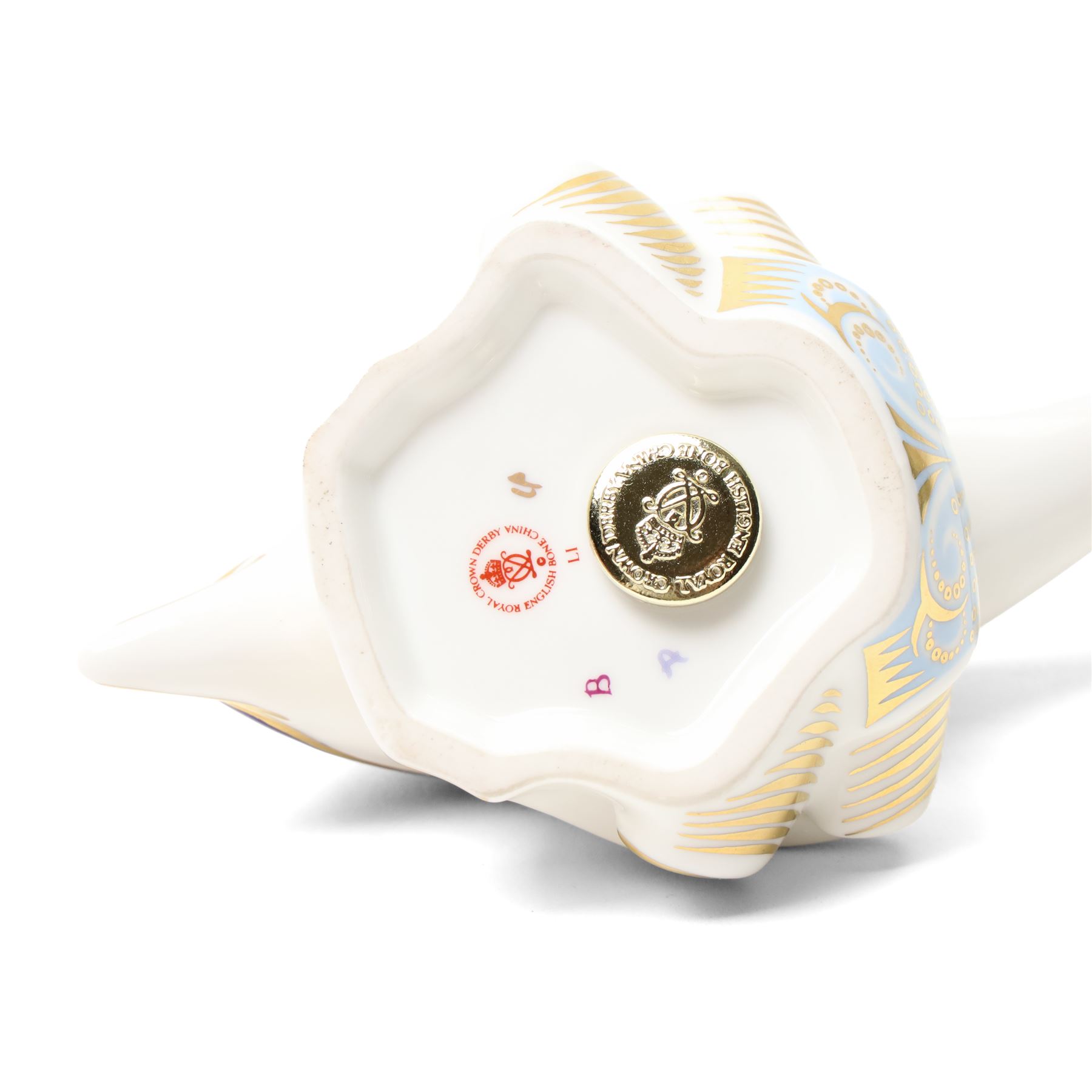 Moorcroft 'Wind of Change' pattern vase H13cm, boxed, Royal Crown Derby 'Striped Dolphin' limited edition paperweight 1166/1500, boxed and with certificate and another Dolphin paperweight, boxed and both with gold stoppers (3)  