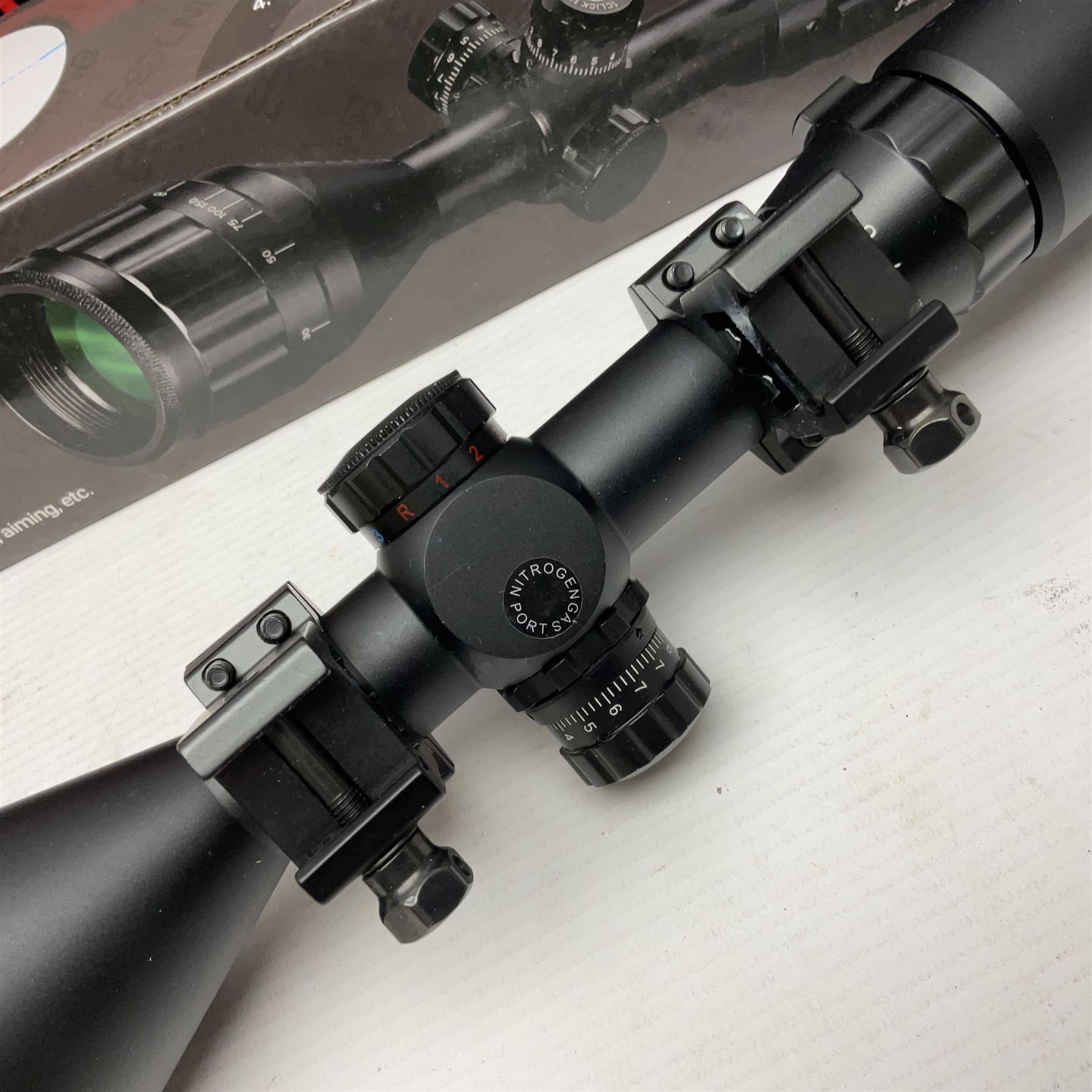 Four shooting accessories - Riflescope 3-9 x 50 scope; Digital Trail Camera; Megaorei M3 night sight add on; and Logan Gun Lamp; all boxed (4)
