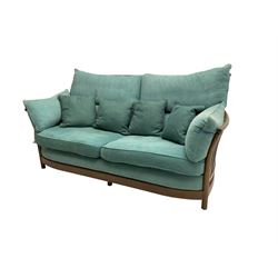 Ercol - 'Renaissance' large two seat sofa, loose cushions upholstered in teal fabric 
